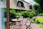 Traumhaftes Reetdach-Ein-Zweifamilienhaus mit parkähnlichem Garten in Angeln - Zweifamilienhaus Scheggerott | Angebot:26565370